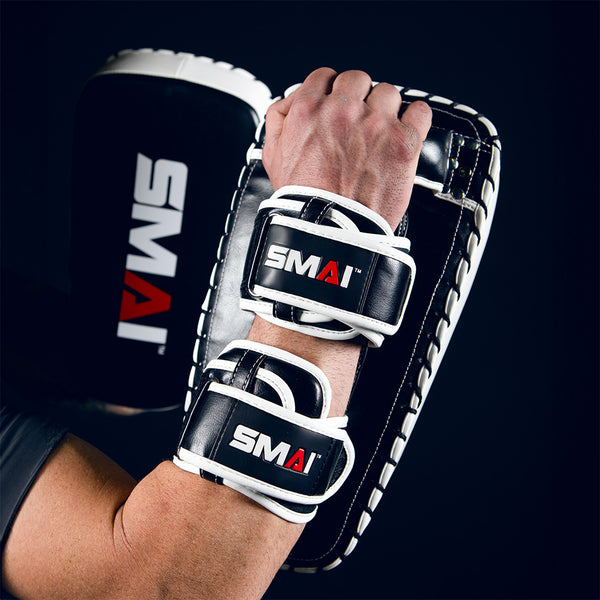 Man Holding Muay Thai Pads