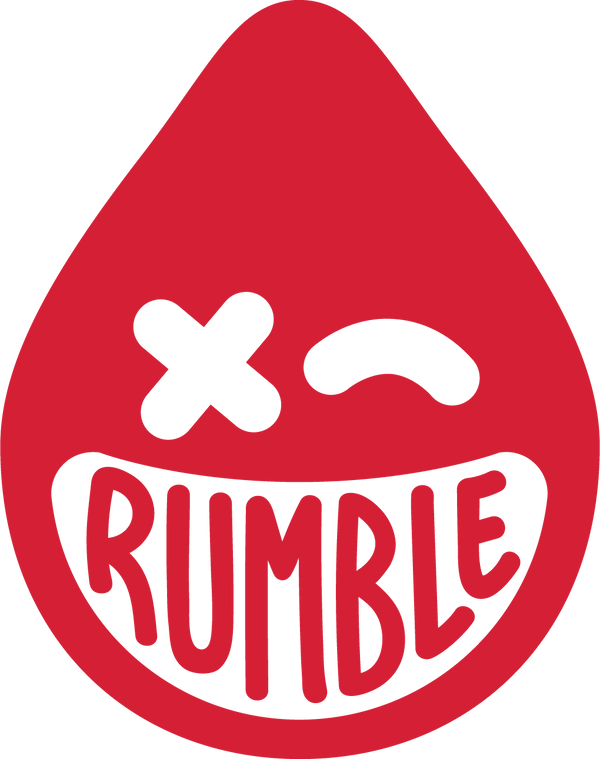 A red teardrop shape with a large, toothy smile and the word "RUMBLE" inside. Above the smile, there is an "X" for one eye and a curved line for the other, resembling a playful or mischievous face.