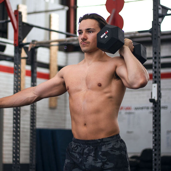 Man lifting 40lb Dumbbell
