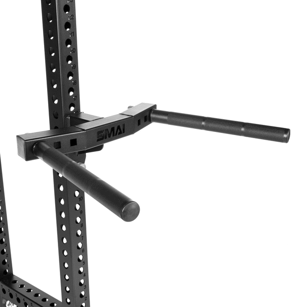 Close-up of the Dip Station Attachment - Vanta Series by SMAI USA, featuring adjustable black metal dip arms with parallel handles, mounted on a power rack—ideal for bodyweight exercises like dips.