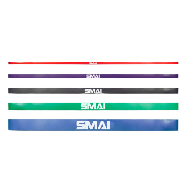 Five SMAI USA Rubber Resistance Bands—red, black, purple, green, and blue—are arranged side by side on a white background, highlighting this versatile set of 5 fitness bands.