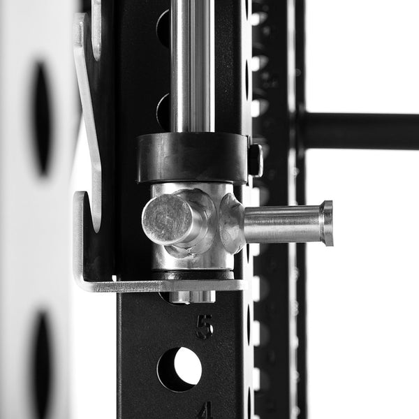 Detail of a safety lock of a universal smith machine