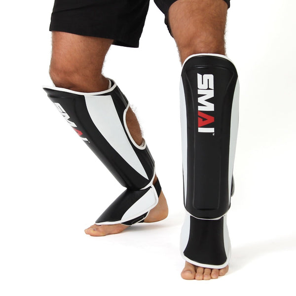 Essentials Shin Guard Muay Thai Front View on feet