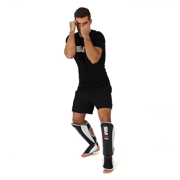 Essentials Shin Guard Muay Thai Front View on Feet 2