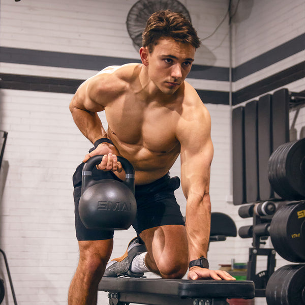 Man rowing a SMAI Competition Kettlebell