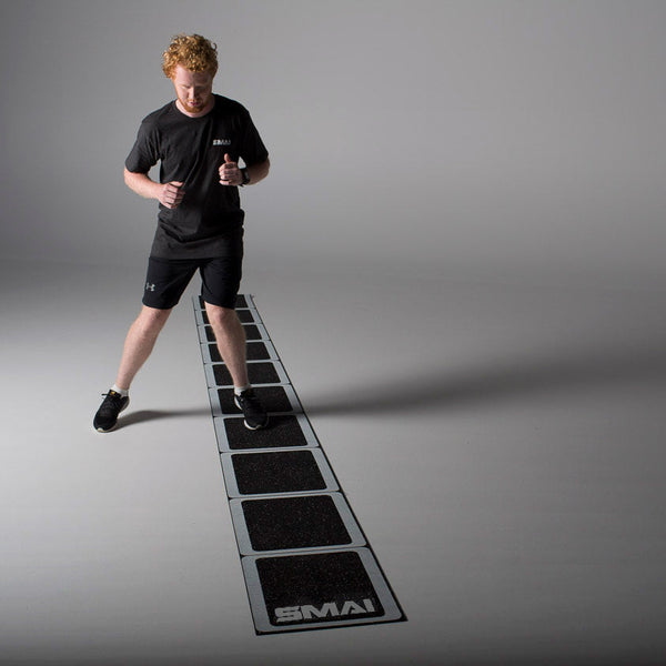 Rubber Rollout Agility Ladder being used by a man