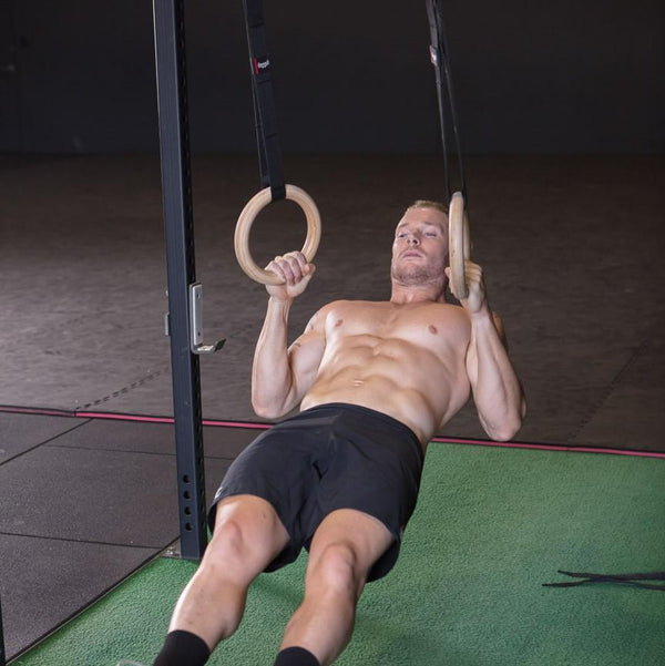 CrossFit athlete using the SMAI Wooden Gym Rings - Easy Straps